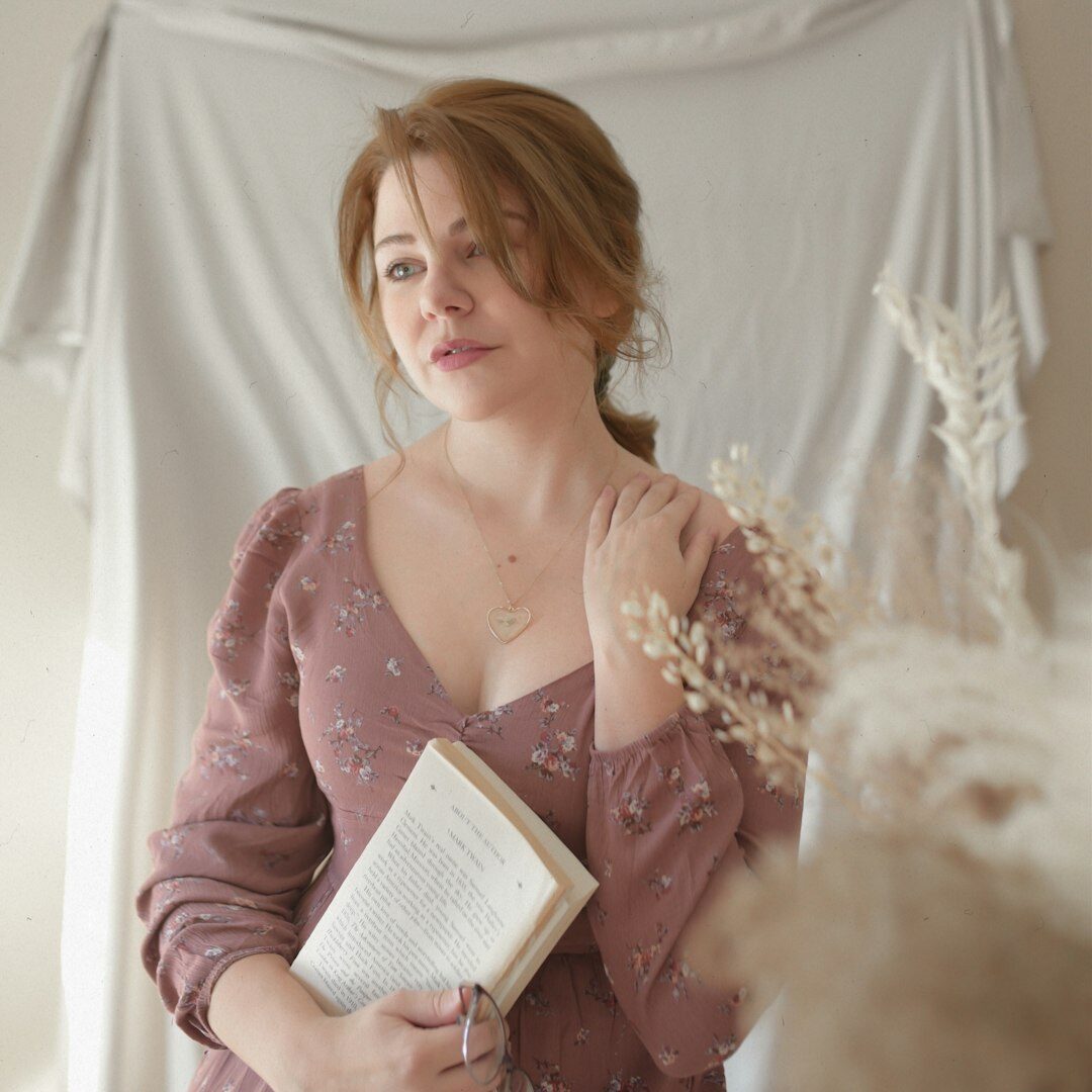Studio portrait of a young argentine woman reader with a confident look