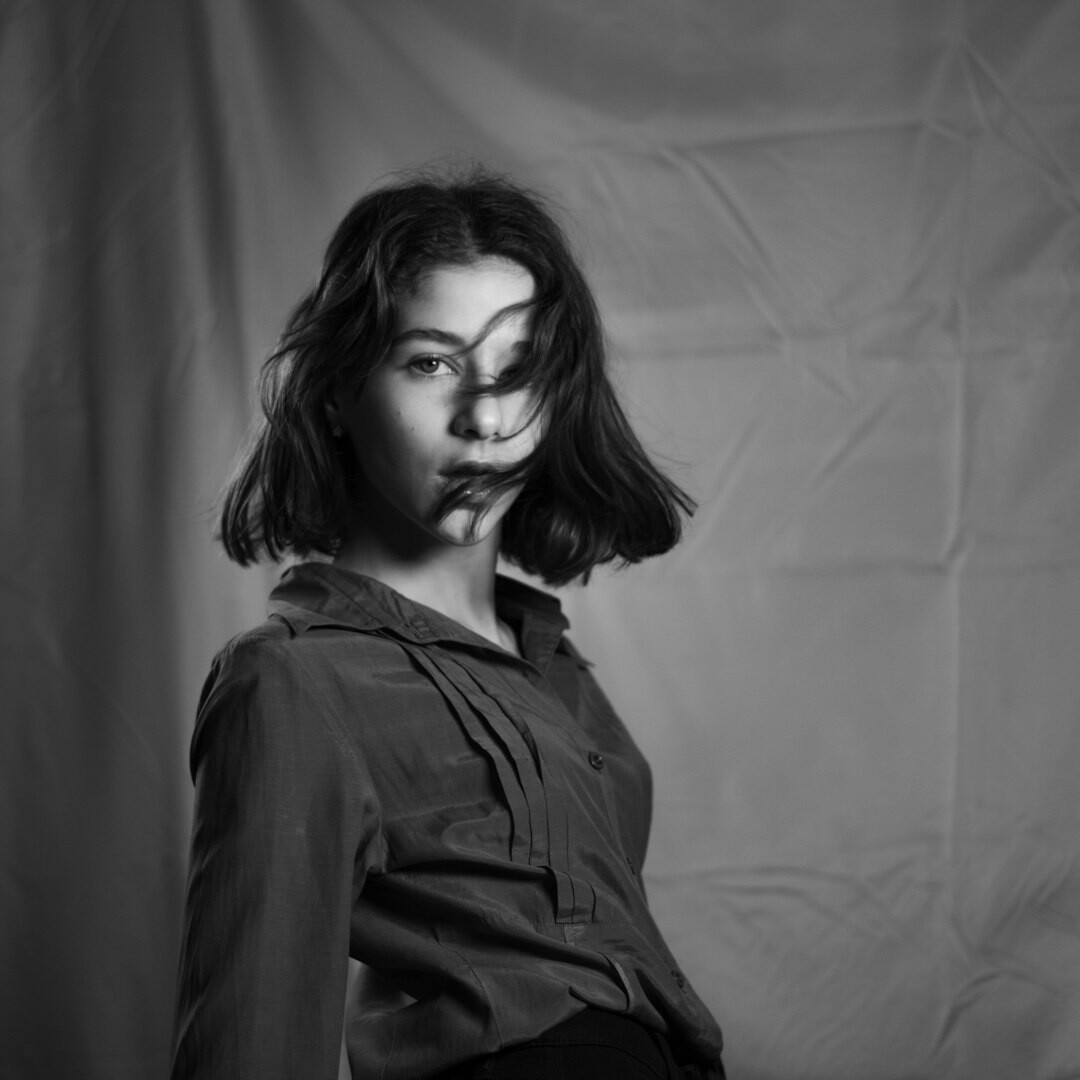 Studio portrait of a confident argentine woman editor in formal attire