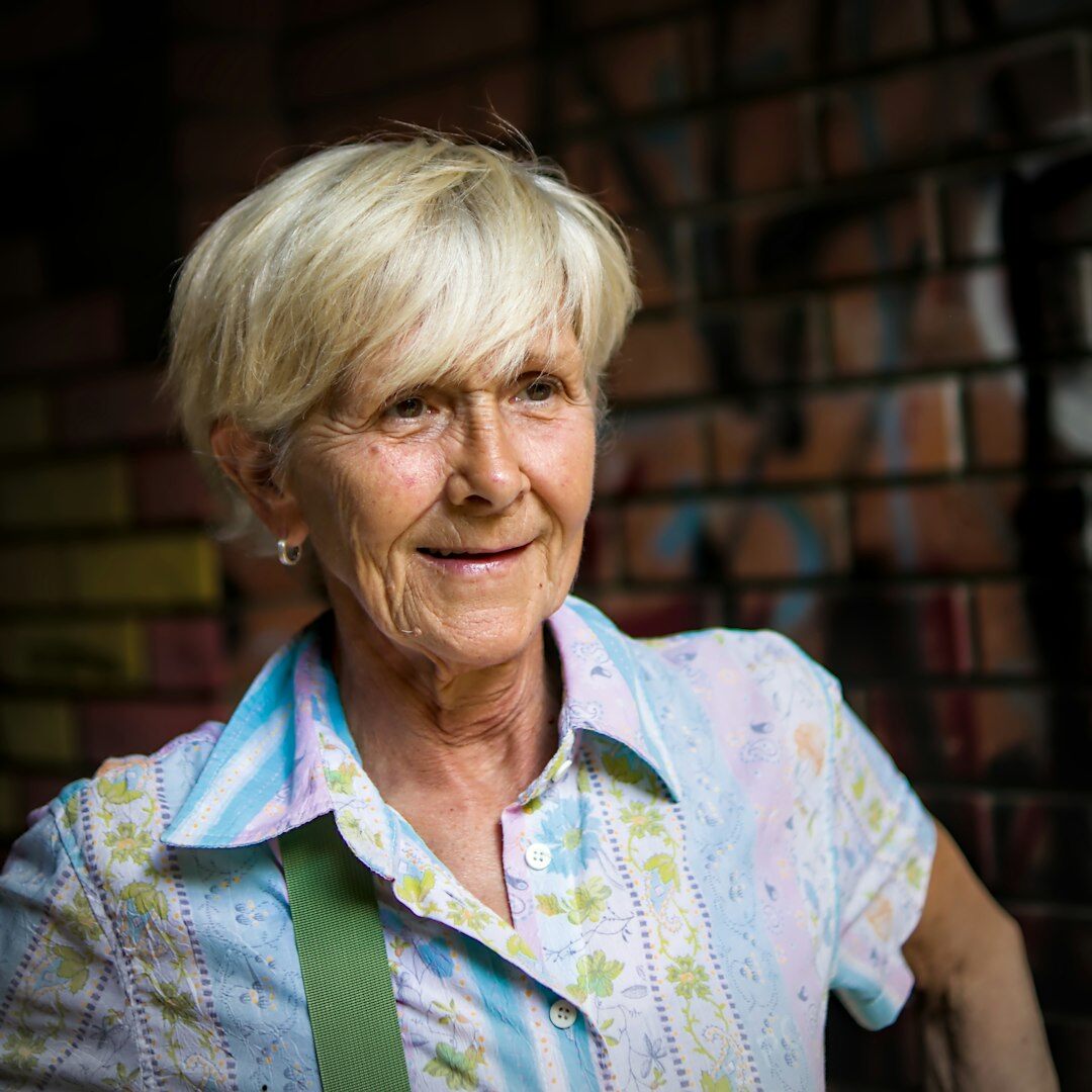 Studio portrait of an argentine woman reader smiling softly